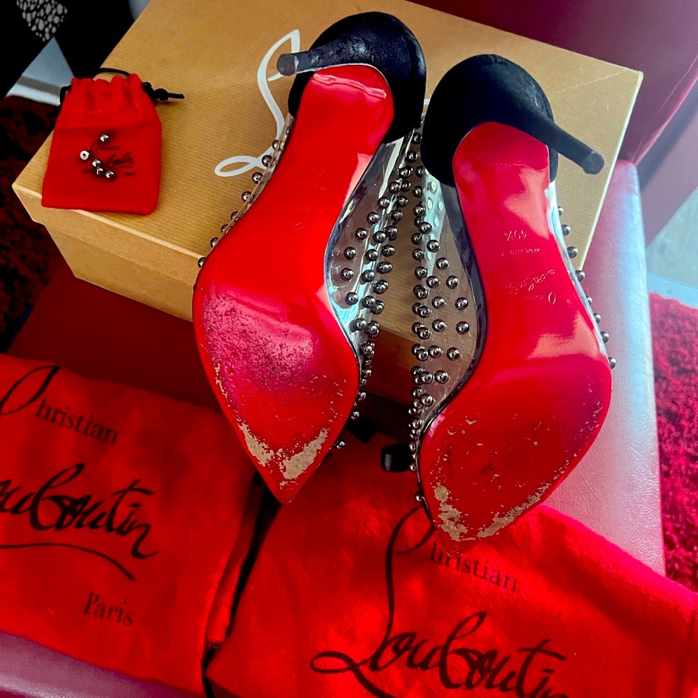 Christian Louboutin damaged used size US 9.5 worn twice . Bow and side needs fix